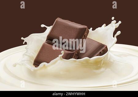 Falling chocolate bars in milk splash with copy space Stock Photo