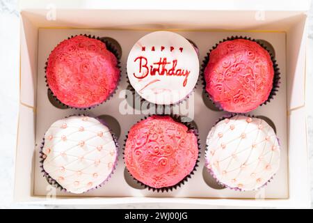 Creating Extravagant Cupcakes for Birthday Celebration Stock Photo