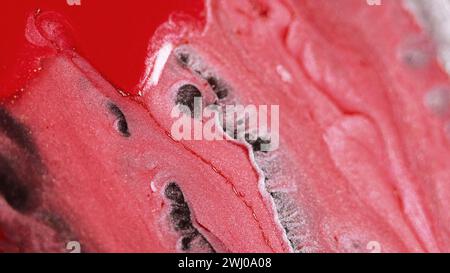 Abstract background liquid pigment red brown pink Stock Photo