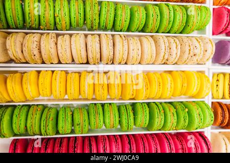 Colorful french macarons background, close up. Tasty sweet color macaroon. Bakery concept.Selective focus. . High quality photo Stock Photo