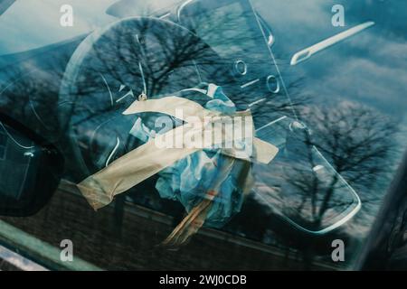 Car airbag glue taped to steering wheel after traffic accident, selective focus Stock Photo