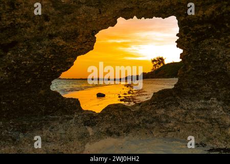 Scenic view of Watamu Beach seen from a hole from a coral rock on the beach in Watamu, Malindi, Kenya Stock Photo