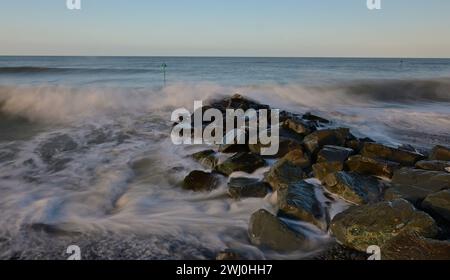 Breaking waves at Tywyn Beach, Gwynedd Wales UK Stock Photo