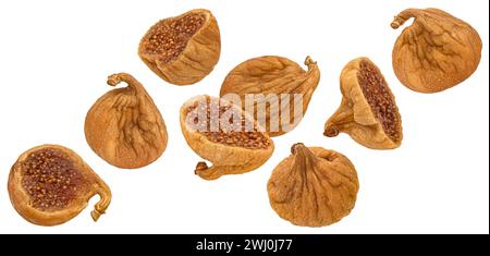 Falling dry figs isolated on white background Stock Photo