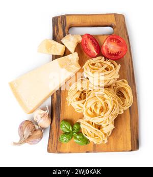 Pasta tagliatelle on a cutting board Stock Photo