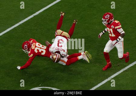 Feb 11, 2024; Las Vegas, Nevada, USA;  San Francisco 49ers wide receiver Ray-Ray McCloud III (3) gets tackled by Kansas City Chiefs cornerback L'Jarius Sneed (38) during the first quarter at Allegiant Stadium during Super Bowl LVIII. The Chiefs defeated the 49ers 25-22 in overtime. (Stan Szeto / Image of Sport) Stock Photo