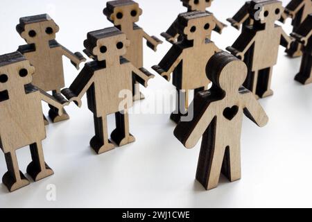 Robot and human figures. Emotions and logic or artificial intelligence. Stock Photo