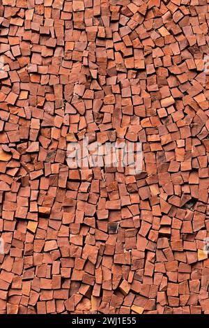 Red mosaic stones on wall Stock Photo