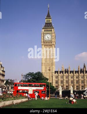 England. London. Big Ben bell clock Elizabeth Tower. Parliament Square gardens & bus. Stock Photo