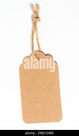 Blank brown rectangular brown paper tag on a rope  on white background, template for price, discount Stock Photo
