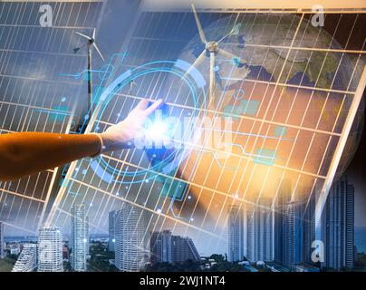 Technology for the environment Using environmentally friendly technology Engineer designs wind turbine models clean energy network Stock Photo