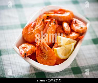 Fresh grilled shrimps with lemon close up Stock Photo