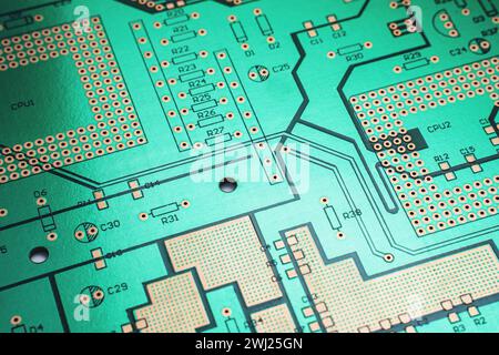 Background of printed circuit board without chips and components Stock Photo