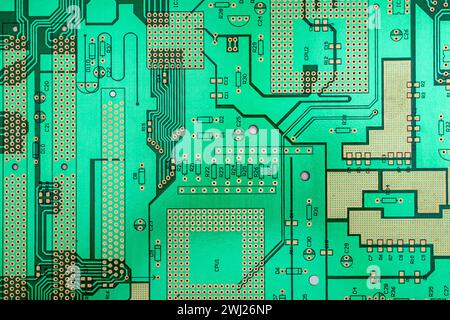 Background of printed circuit board without chips and components Stock Photo