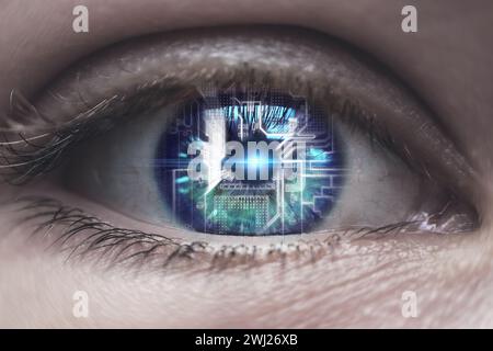 Female eye with overlay of printed circuit board. Concepts of Artificial intelligence development or Microchip implants Stock Photo