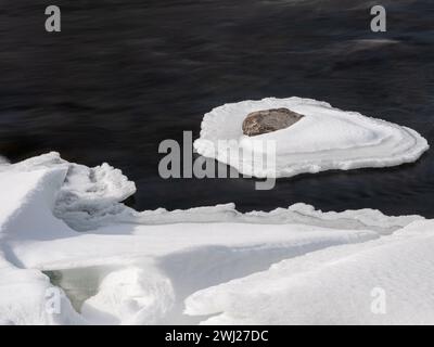 Long exposure medium format photo of river ice breaking up at spring.Shot in Sweden, Scandinavia Stock Photo
