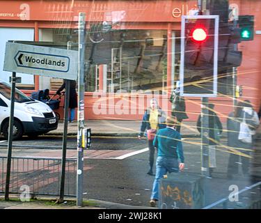 Glasgow, Scotland, UK. 12th February, 2024. UK Weather:  West end traffic problems in woodlands  Cold start saw locals on the streets in the centre of the city. Credit Gerard Ferry/Alamy Live News Stock Photo