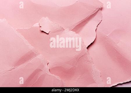 Crumpled and torn Pink paper texture background for design Stock Photo