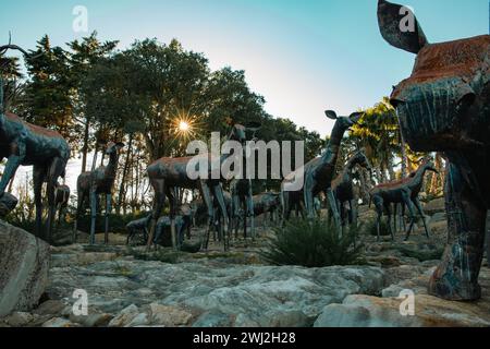 Plants and animal sculptures in Bacalhoa Buddha Eden Park in Portugal Stock Photo