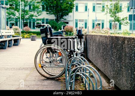 Wheelchairs for the disabled parking in a hospital with old condition. Breakdown is not available. Stock Photo