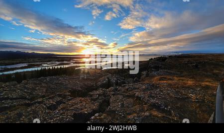A Sunset over expansive body of water in Iceland Stock Photo