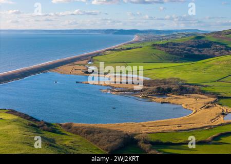 Abbotsbury, Dorset, UK.  12th February 2024.  UK Weather.  Aerial view of Abbotsbury Swannery at Abbotsbury on the Dorset Jurassic Coast on a warm sunny afternoon.  Picture Credit: Graham Hunt/Alamy Live News Stock Photo