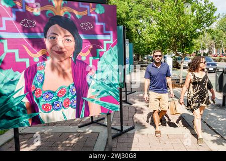 Merida Mexico,Merida Mexico,Zona Paseo Montejo Centro,sidewalk exhibit man men male,woman women lady female,adult adults resident residents,couple cou Stock Photo