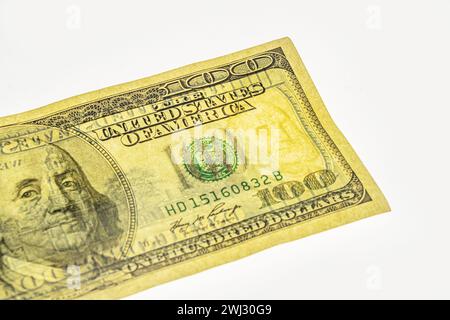 fragment of 100 dollar banknote with visible details of banknote reverse for design purpose. Franklin watermark on 100 bill Stock Photo