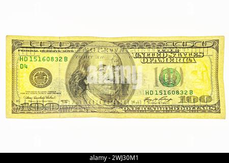 fragment of 100 dollar banknote with visible details of banknote reverse for design purpose. Franklin watermark on 100 bill Stock Photo