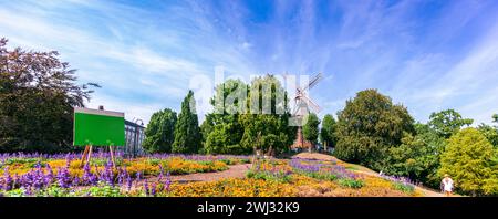 HerdentorsmÃ¼hle. Windmill in the ramparts, wall of the city of Bremen. Old windmill in a public park Stock Photo