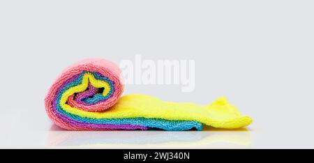 Microfiber cleaning cloth. colorful microfiber towels isolated on white background. rolled up cleani Stock Photo