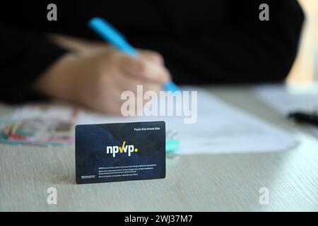 Indonesia NPWP new tax id Number card originally called Nomor Pokok Wajib Pajak. Used to carry out transactions related to taxation for Indonesian taxpayers. Stock Photo