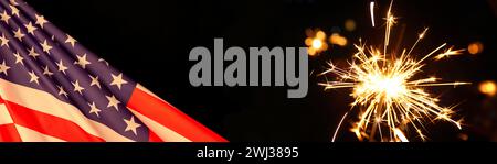 American Celebration - United States, Usa flag and burning sparkler firework on black banner backgro Stock Photo