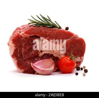 Huge raw ribeye steak garnished with spices Stock Photo