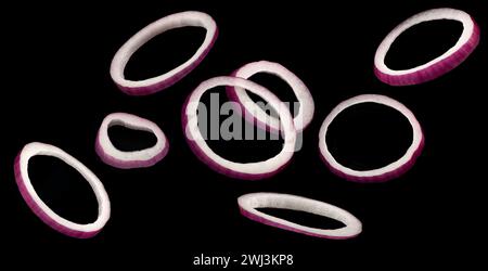 Red onion rings isolated on black background Stock Photo
