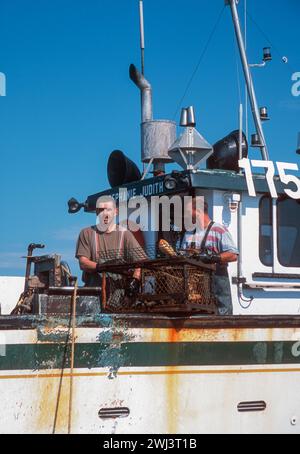 Lobstering off the coast of cap aux Meules, Isles d' Madeleine, Magdalen Islands, in the Gulf of St Lawrence, Quebec, Canada Stock Photo