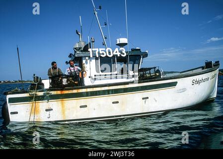 Lobstering off the coast of cap aux Meules, Isles d' Madeleine, Magdalen Islands, in the Gulf of St Lawrence, Quebec, Canada Stock Photo