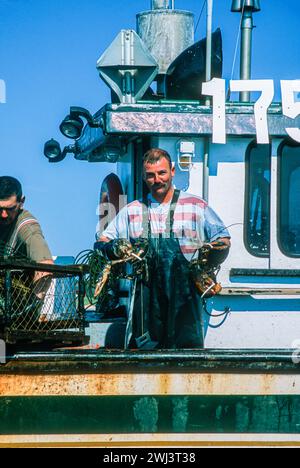 Lobstering off the coast of cap aux Meules, Isles d' Madeleine, Magdalen Islands, in the Gulf of St Lawrence, Quebec, Canada Stock Photo