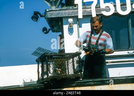 Lobstering off the coast of cap aux Meules, Isles d' Madeleine, Magdalen Islands, in the Gulf of St Lawrence, Quebec, Canada Stock Photo