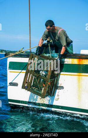 Lobstering off the coast of cap aux Meules, Isles d' Madeleine, Magdalen Islands, in the Gulf of St Lawrence, Quebec, Canada Stock Photo