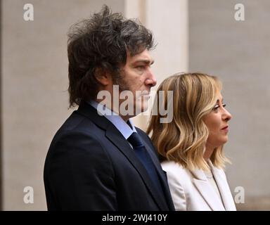 Rome, Italy. 12th Feb, 2024. Italian Prime Minister Giorgia Meloni (R) welcomes Argentine President Javier Milei in Rome, Italy, on Feb. 12, 2024. Italian Prime Minister Giorgia Meloni hosted newly-elected Argentine President Javier Milei in Rome on Monday, discussing a wide range of issues including energy and agriculture. Credit: Alberto Lingria/Xinhua/Alamy Live News Stock Photo