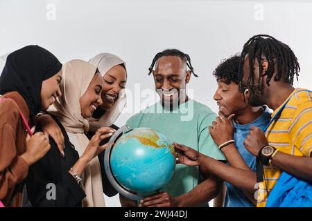 A diverse group of students is gathered around a globe, engrossed in exploration and study, their vibrant energy captured agains Stock Photo