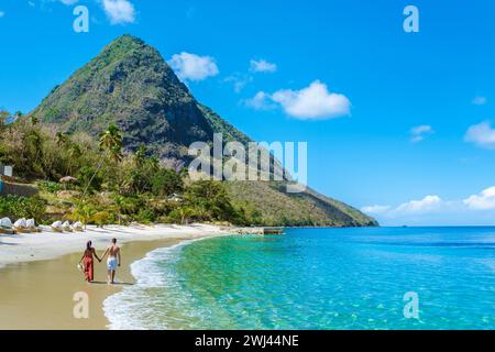 Young couple men and women vacation Saint Lucia, luxury holiday Saint Lucia Caribbean, Sugar beach Stock Photo