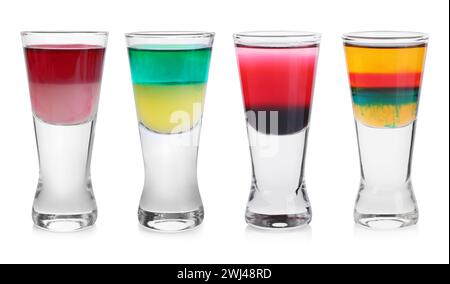 Different shooters in shot glasses isolated on white, set Stock Photo