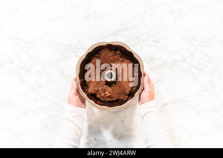 Batter to Pan - Chocolate Bundt Cake Preparation Stock Photo