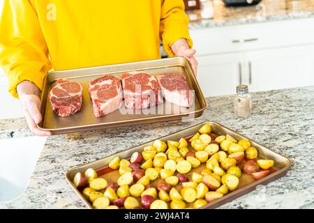 Seasoned Rib Eye Steak Ready for Grilling Stock Photo