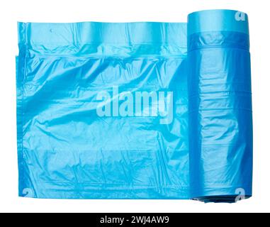 Blue plastic trash bags with strings on white background Stock Photo