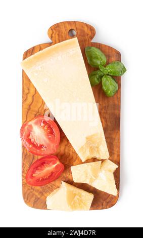 Parmesan cheese on a cutting board Stock Photo