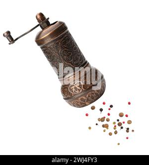 Copper hand mill for pepper and salt isolated on white background Stock Photo