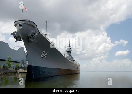 battleship USS Wisconsin BB-64 - berthed next to the Nauticus or National Maritime Center on the Elizabeth River Stock Photo